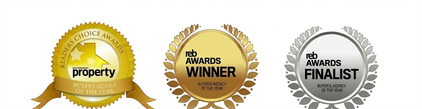 Industry award badges from Jake Milne’s career as a buyers’ agent